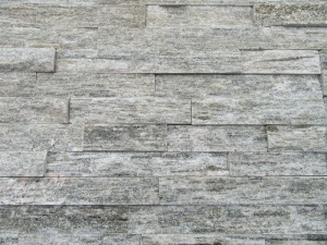 Placage de mur en pierre de culture en quartzite blanc en bois